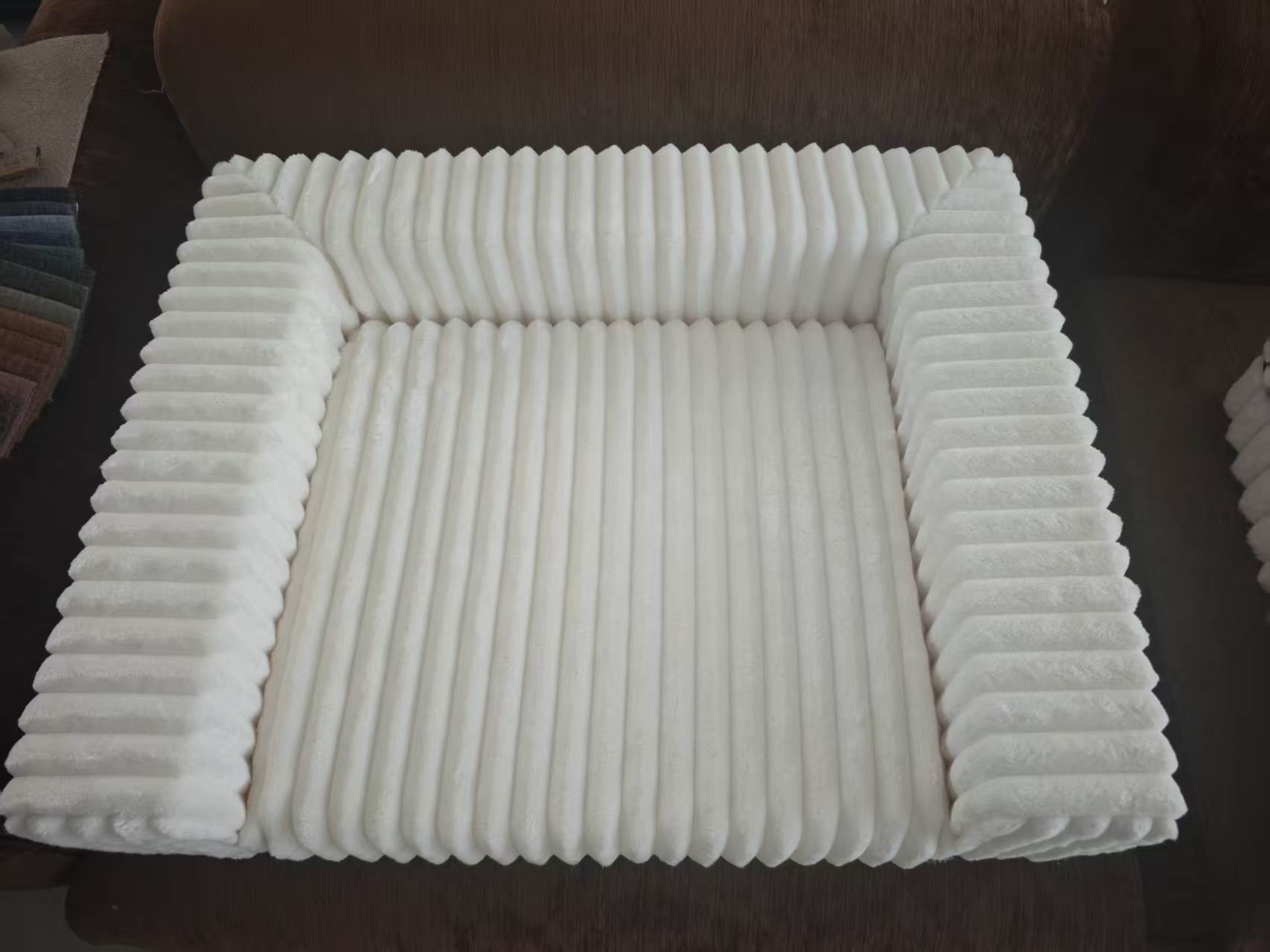 White three-sided dog bed before compression